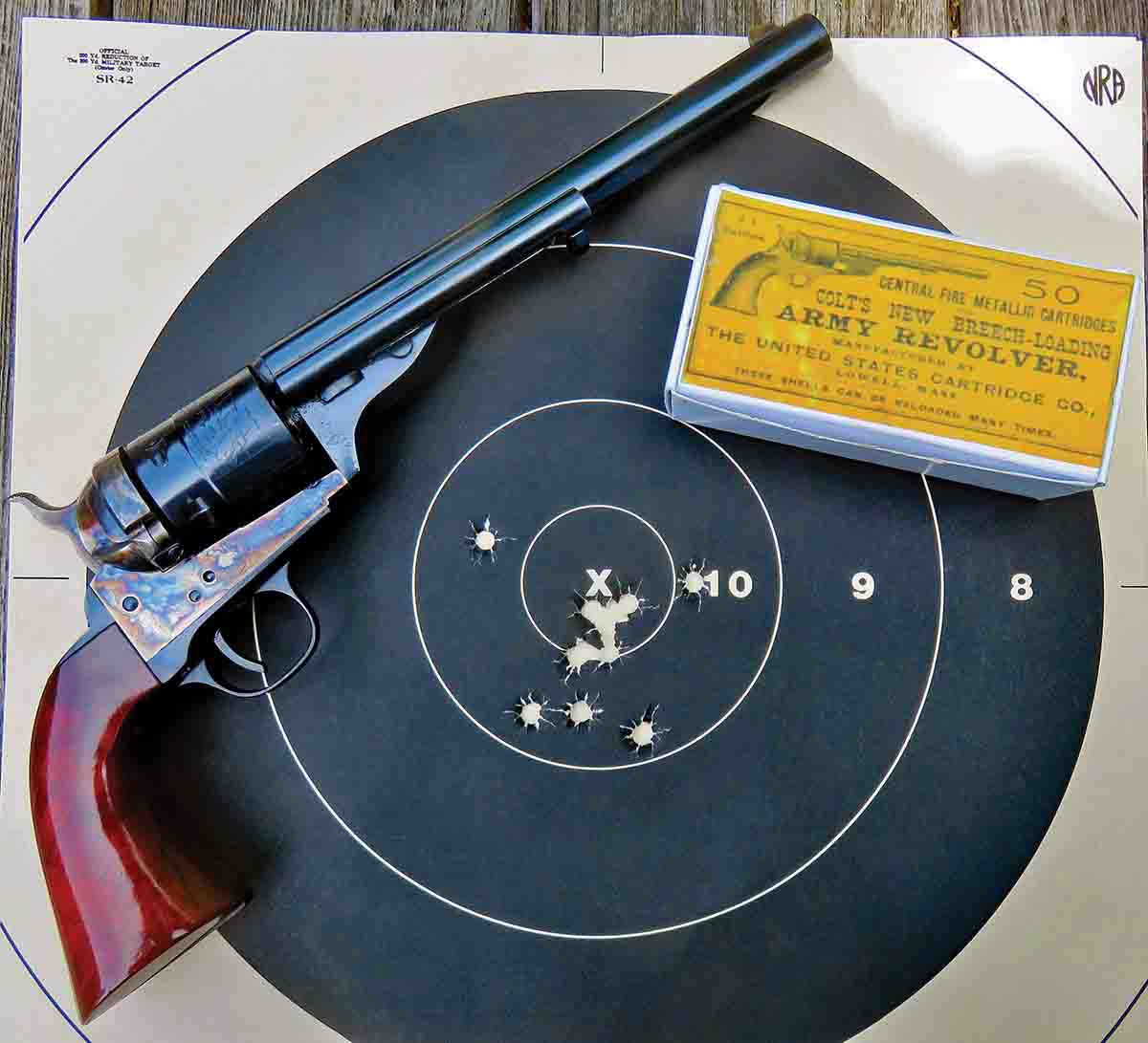 10 shots with Mike's .44 Colt by Cimarron Firearms shows a score of 100 with 5Xs